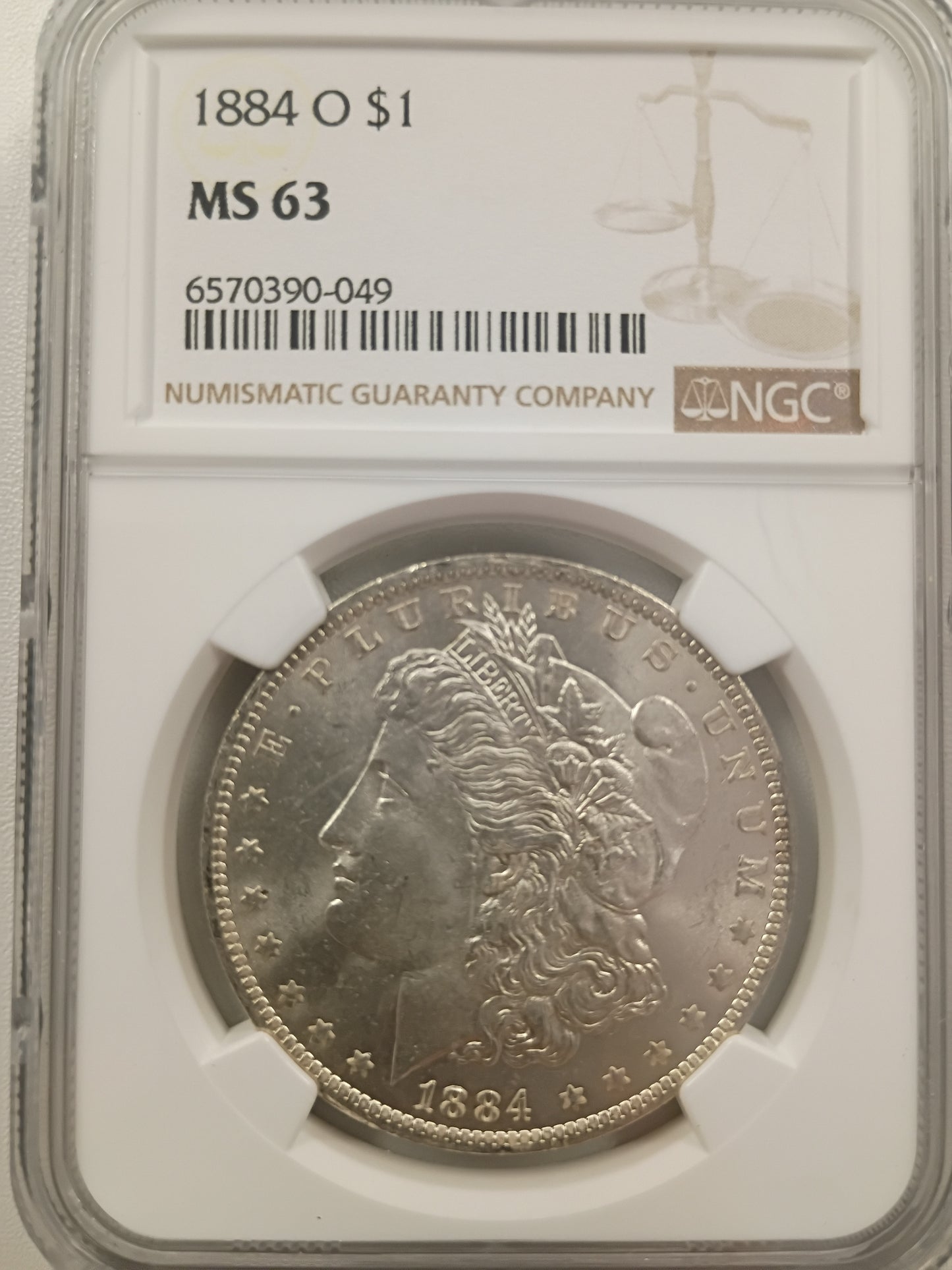 1884-O Morgan Silver Dollar | NGC MS63 | New Orleans Mint | Cert #6570390-049