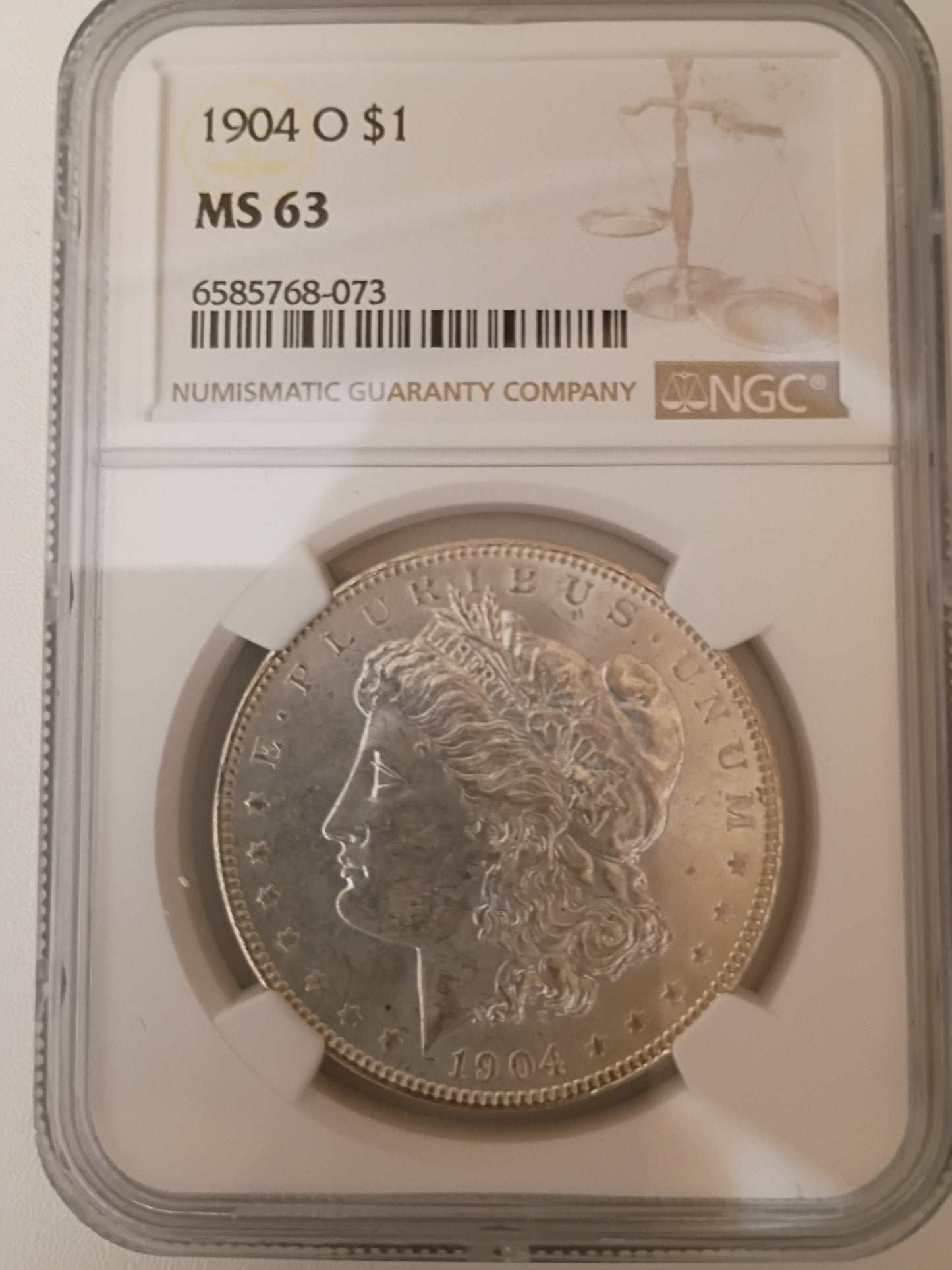 1904-O Morgan Silver Dollar | NGC MS63 | New Orleans Mint | Cert #6585768-073
