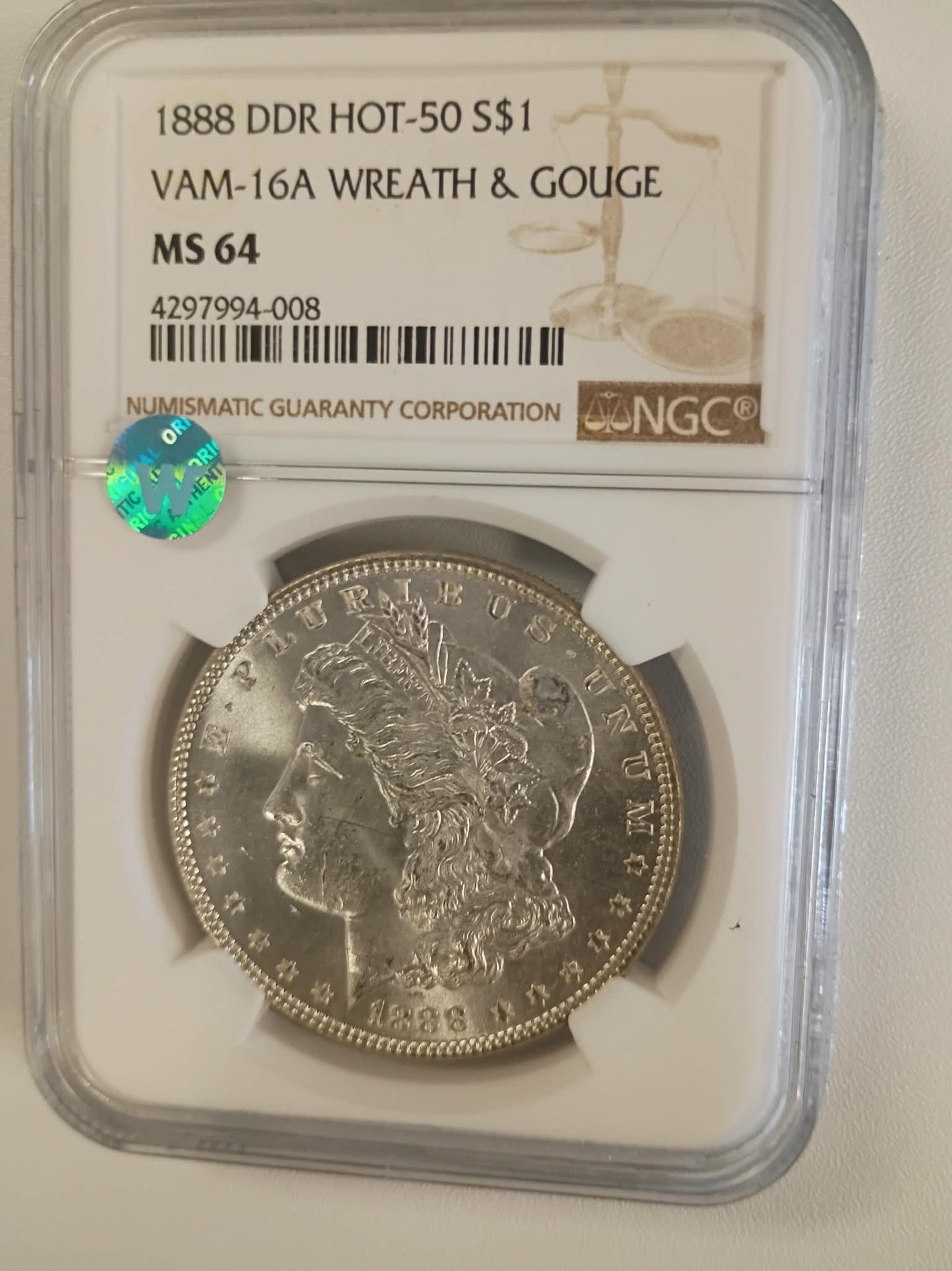 1888 Morgan Silver Dollar | NGC MS64 | VAM-16A DDR “Hot-50” | Wreath & Gouge Variety | Philadelphia Mint | Cert #4297994-008